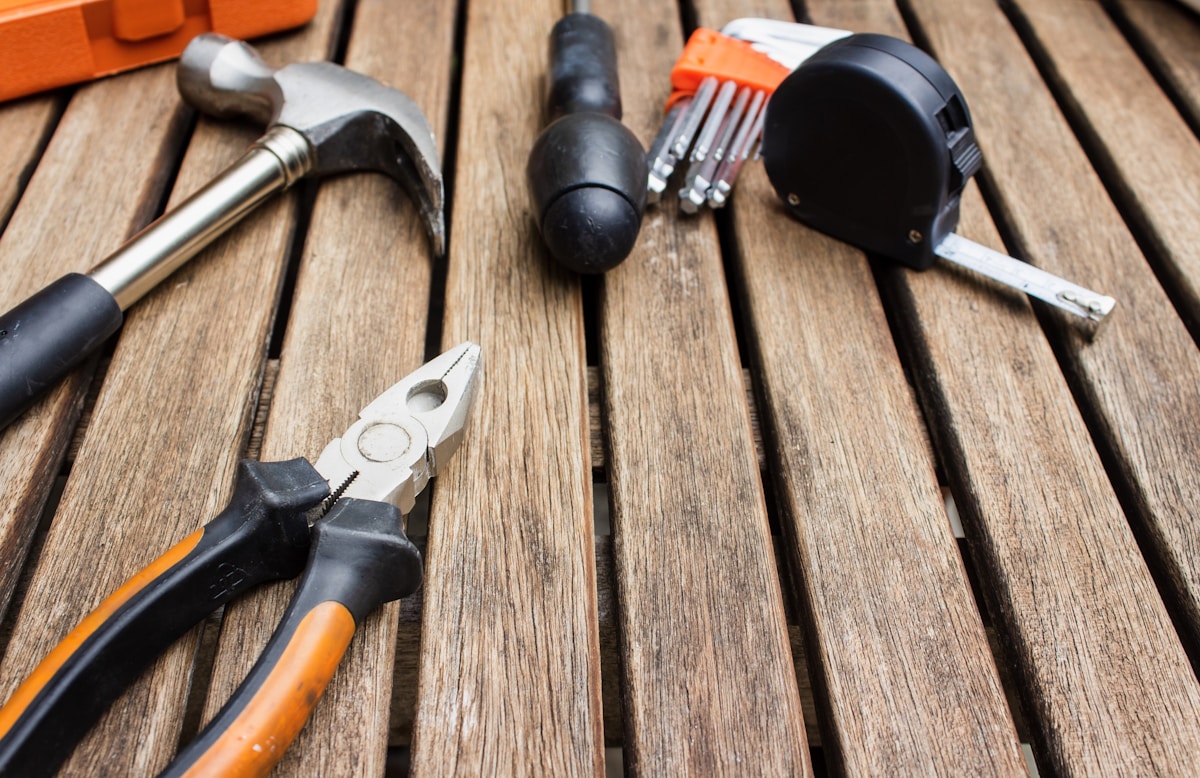 Carpentry tools laid out on a workbench